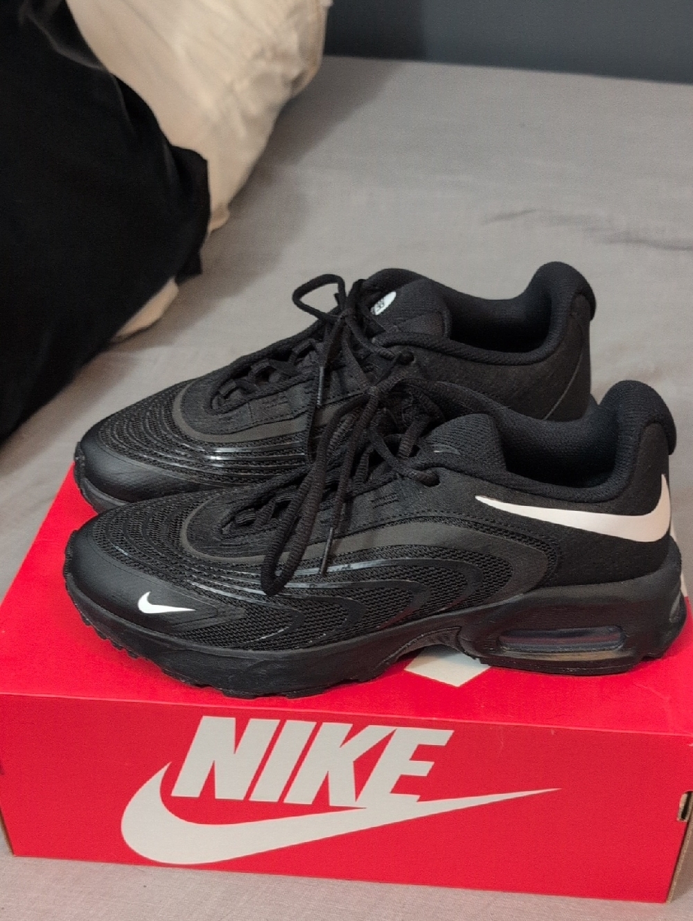 Nike Men’s Black Sneakers with White Swoosh